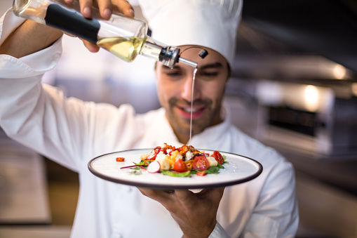 Chef with dish